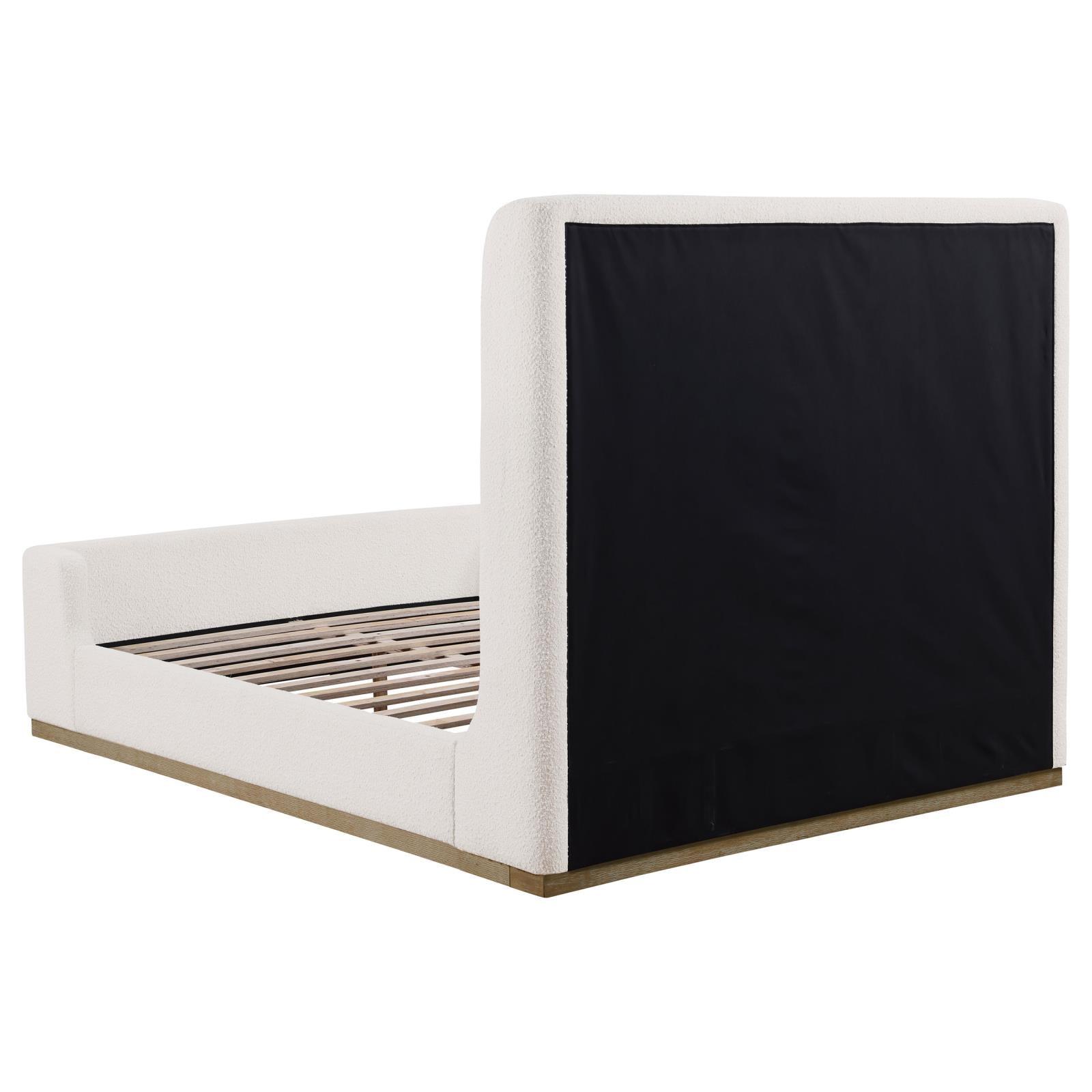 Side view of Nala Upholstered King platform bed with wingback headboard