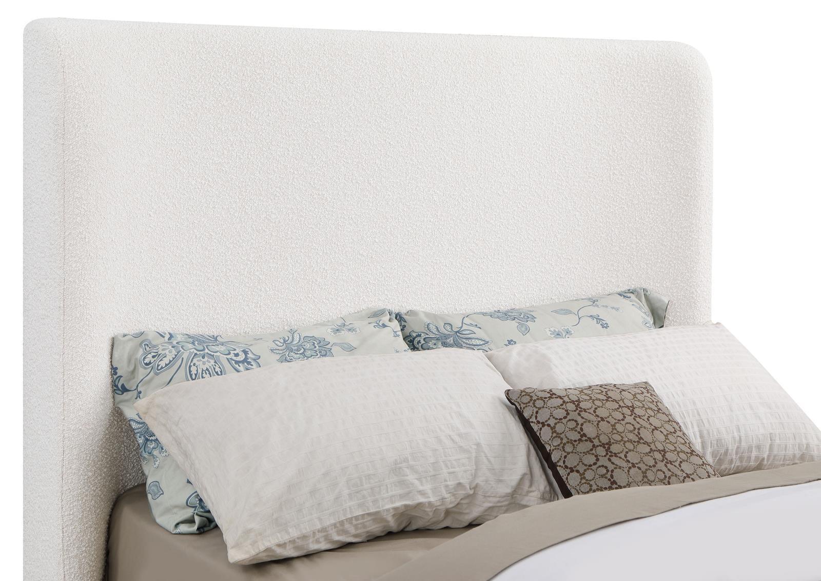 Angled view of bed showing metal mounting brackets under rails