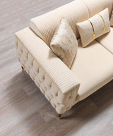 Front angle showing sofa cushions and velvet texture