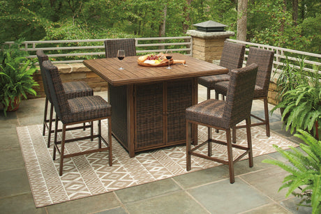Medium Brown outdoor bar table and bar stools set on patio