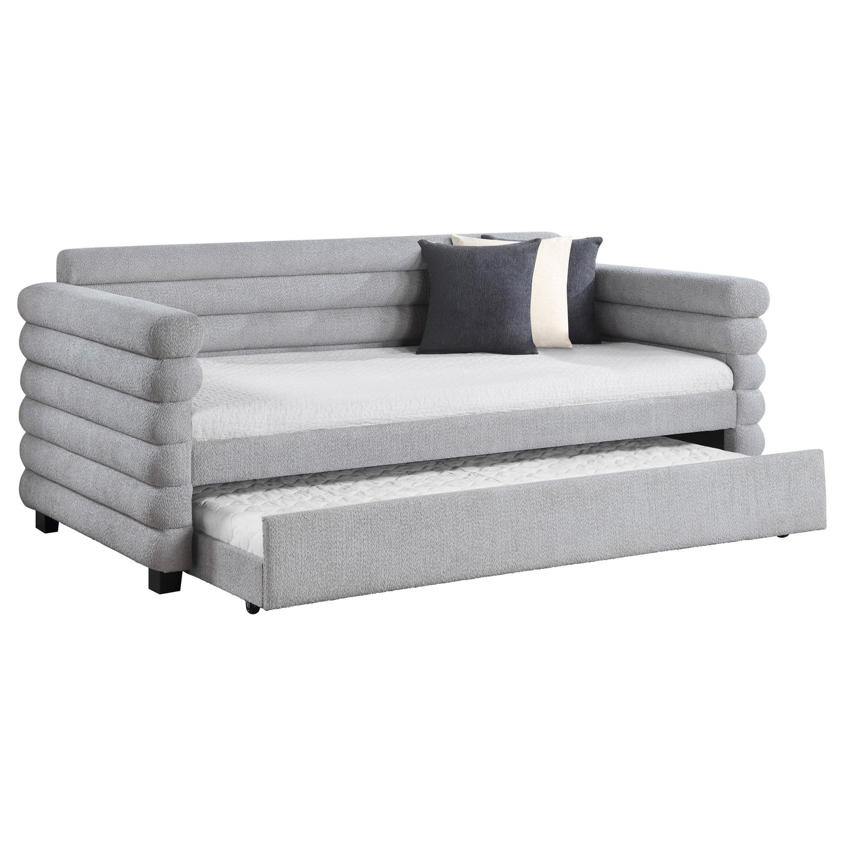 Patricia daybed trundle pulled out, showing twin mattress in grey upholstery
