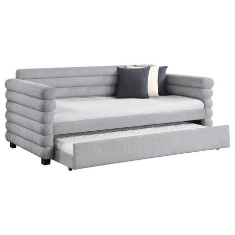 Patricia daybed trundle pulled out, showing twin mattress in grey upholstery