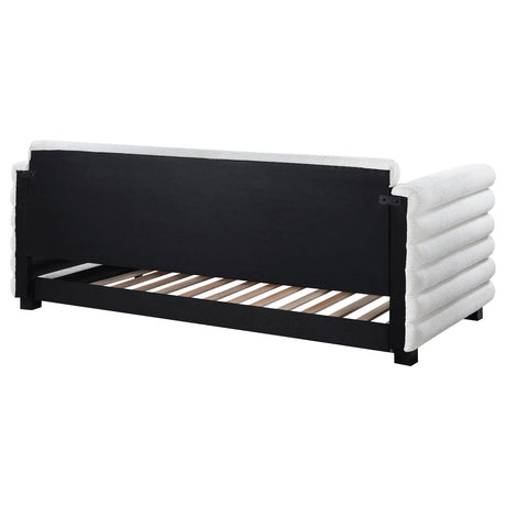 White upholstery on Patricia daybed highlighting foam and stitching