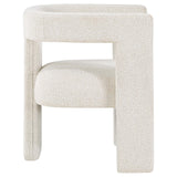 Petra Boucle Upholstered Accent Chair on light floor