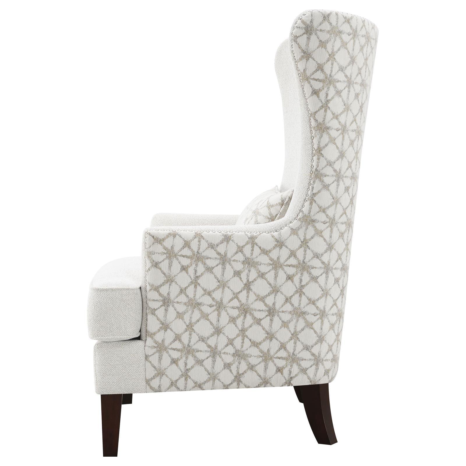 Welt-trimmed kidney pillow on Pippin accent chair