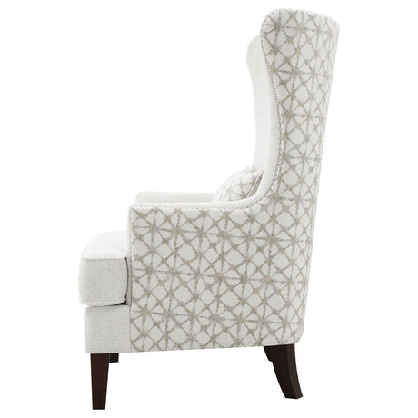 Welt-trimmed kidney pillow on Pippin accent chair
