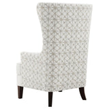 Deep brown rubberwood legs of Pippin Wingback chair