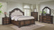 side view of Ludwig Brown Upholstered Panel Bedroom Set bed