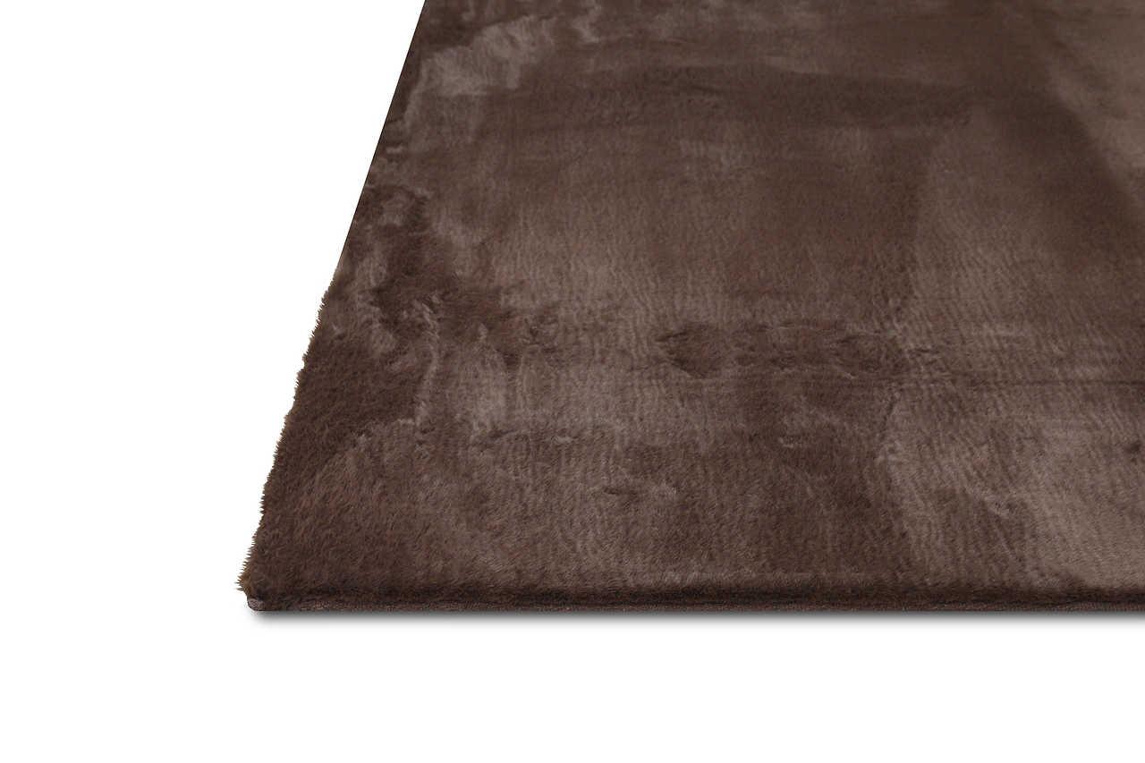 Rabbit Chocolate medium area rug in living room setting