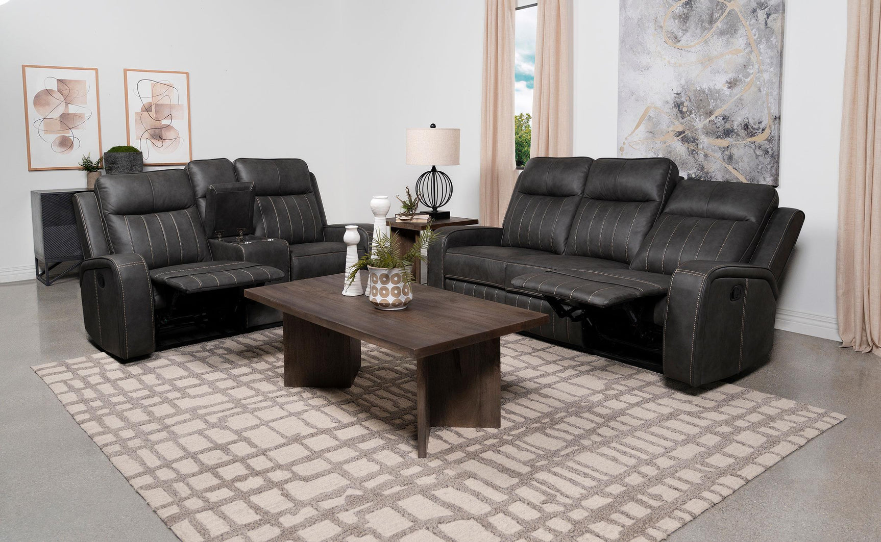 Raelynn reclining loveseat with center console and cup holders