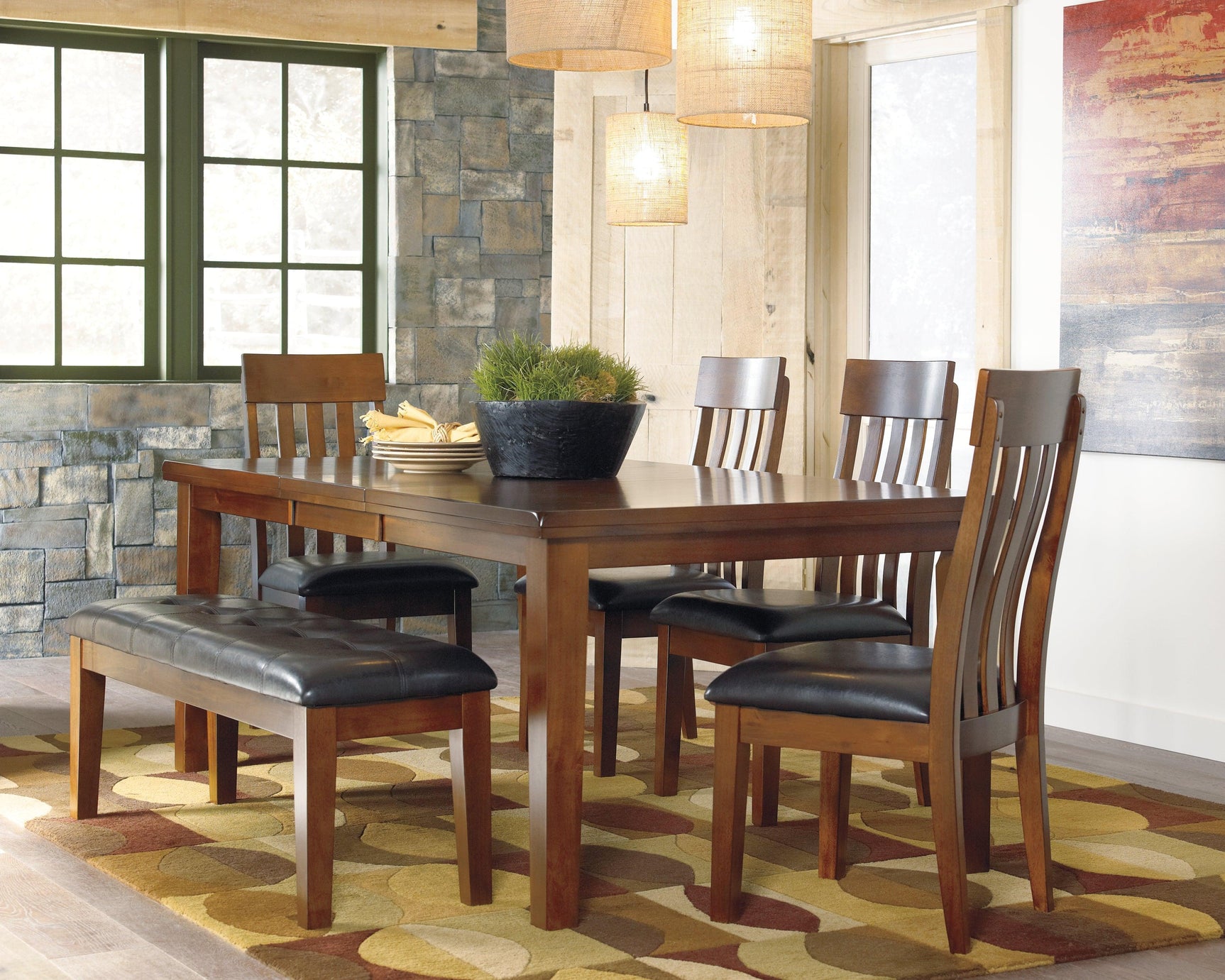 Ralene dining set medium brown rectangular table and chairs room view