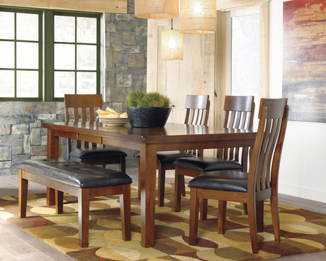 Ralene dining set medium brown rectangular table and chairs room view