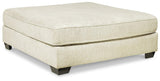 detail view of Rawcliffe Parchment 4-Piece Sectional Sofa upholstery and cushions