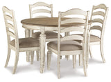 Oval dining table with extended leaf and upholstered chairs