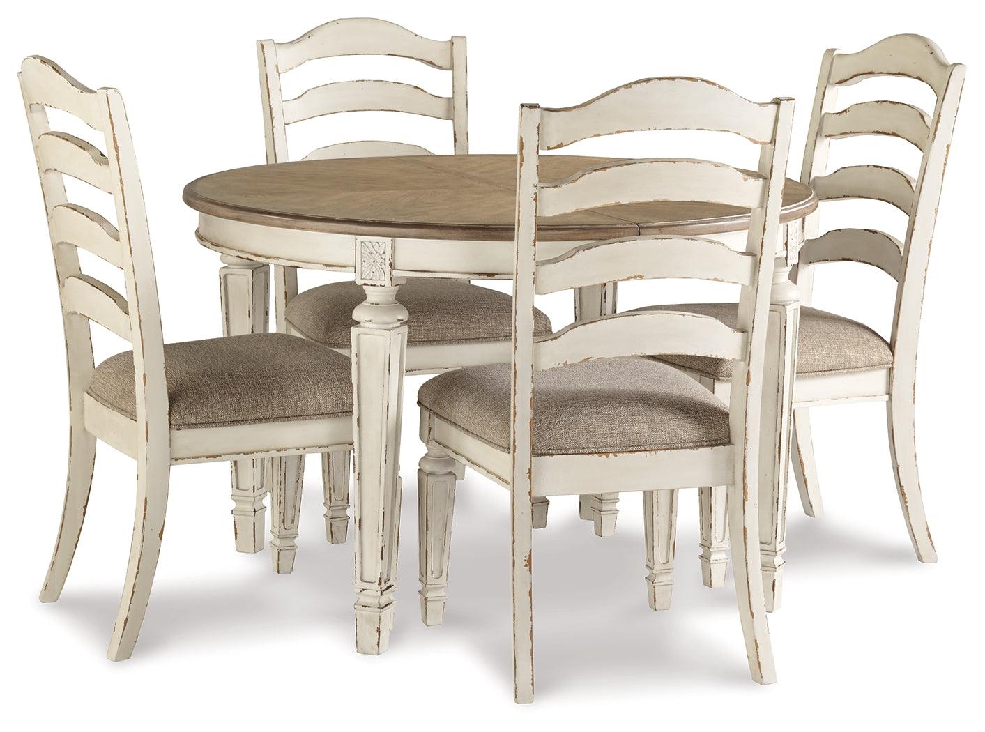 Oval dining table with extended leaf and upholstered chairs