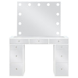 Close-up of vanity mirror surrounded by 11 light bulbs