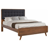 Side view of Robyn dark walnut upholstered headboard king bed