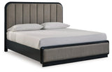 Rowanbeck King Bed angled view showing curved silhouette and channel tufting