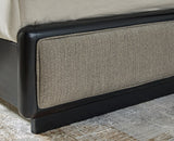 Gray herringbone upholstery detail on vertical channels