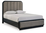 Rowanbeck Gray Black Queen Upholstered Panel Bed angled side view