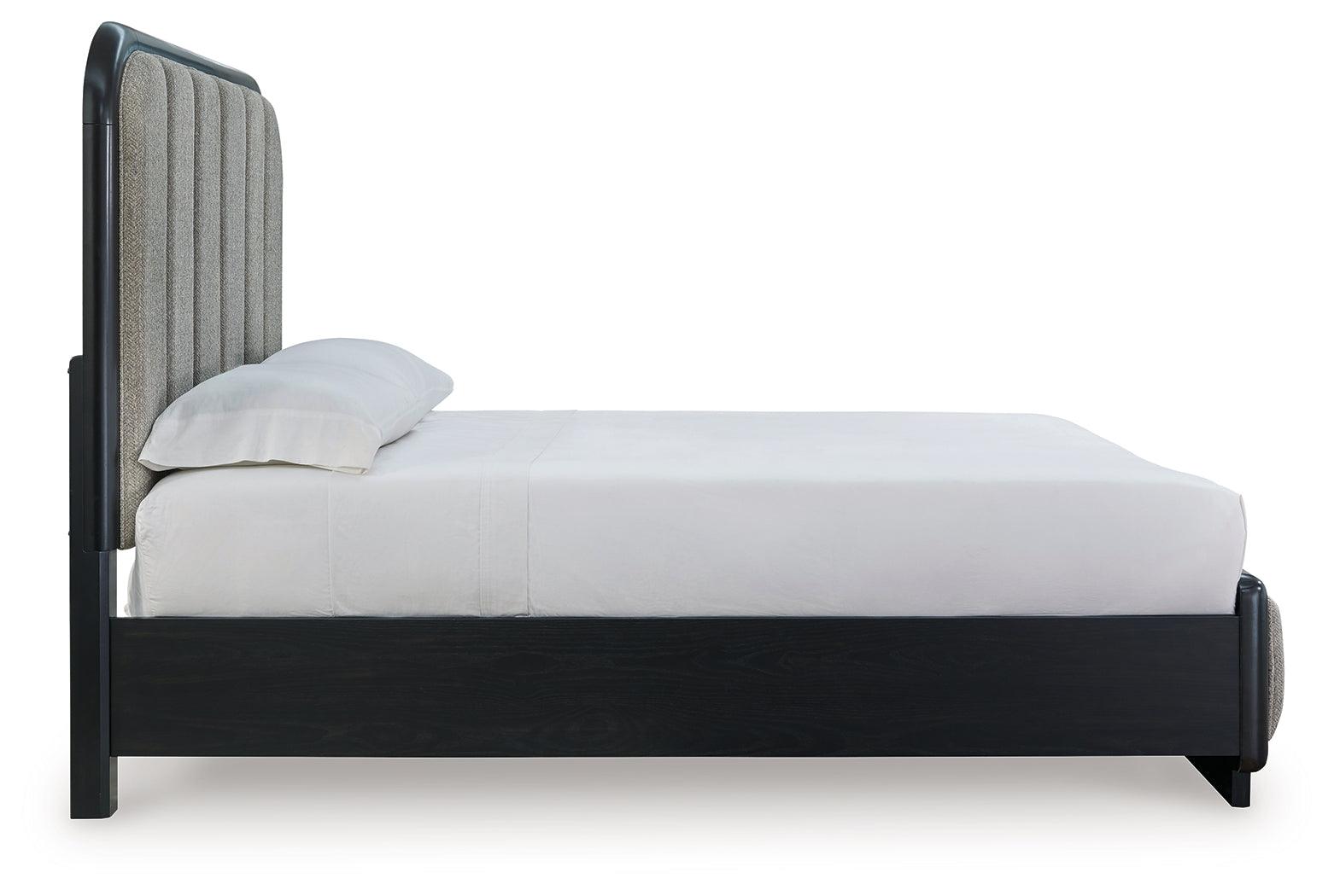 Rowanbeck Gray Black Queen Upholstered Panel Bed showcasing textured wood grain finish