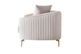 Detail view of sofa armrest and velvet texture