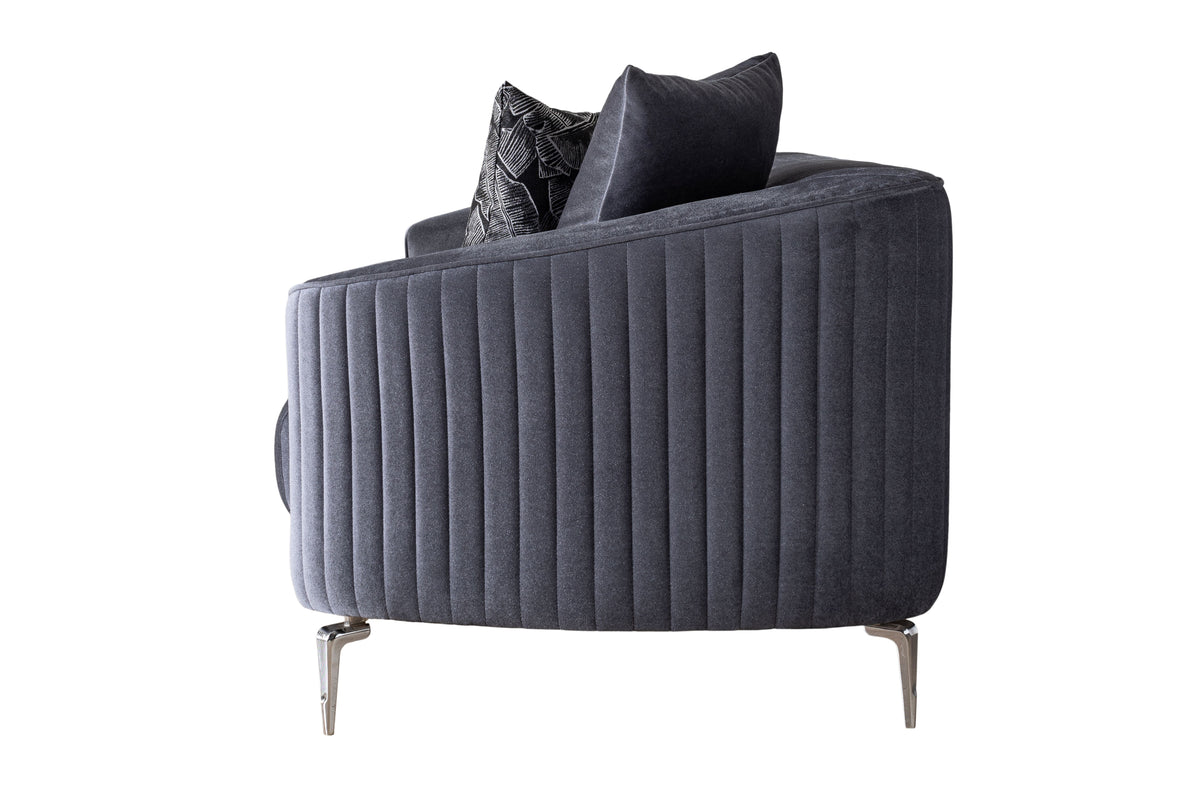 Detailed side view of sofa armrest