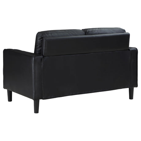 Detailed view of armrest and cushions on Ruth sofa