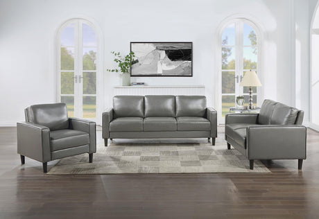Ruth Grey Accent Chair angled to highlight dimensions