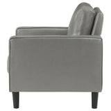 Side detail of Ruth Grey Faux Leather Accent Chair armrest