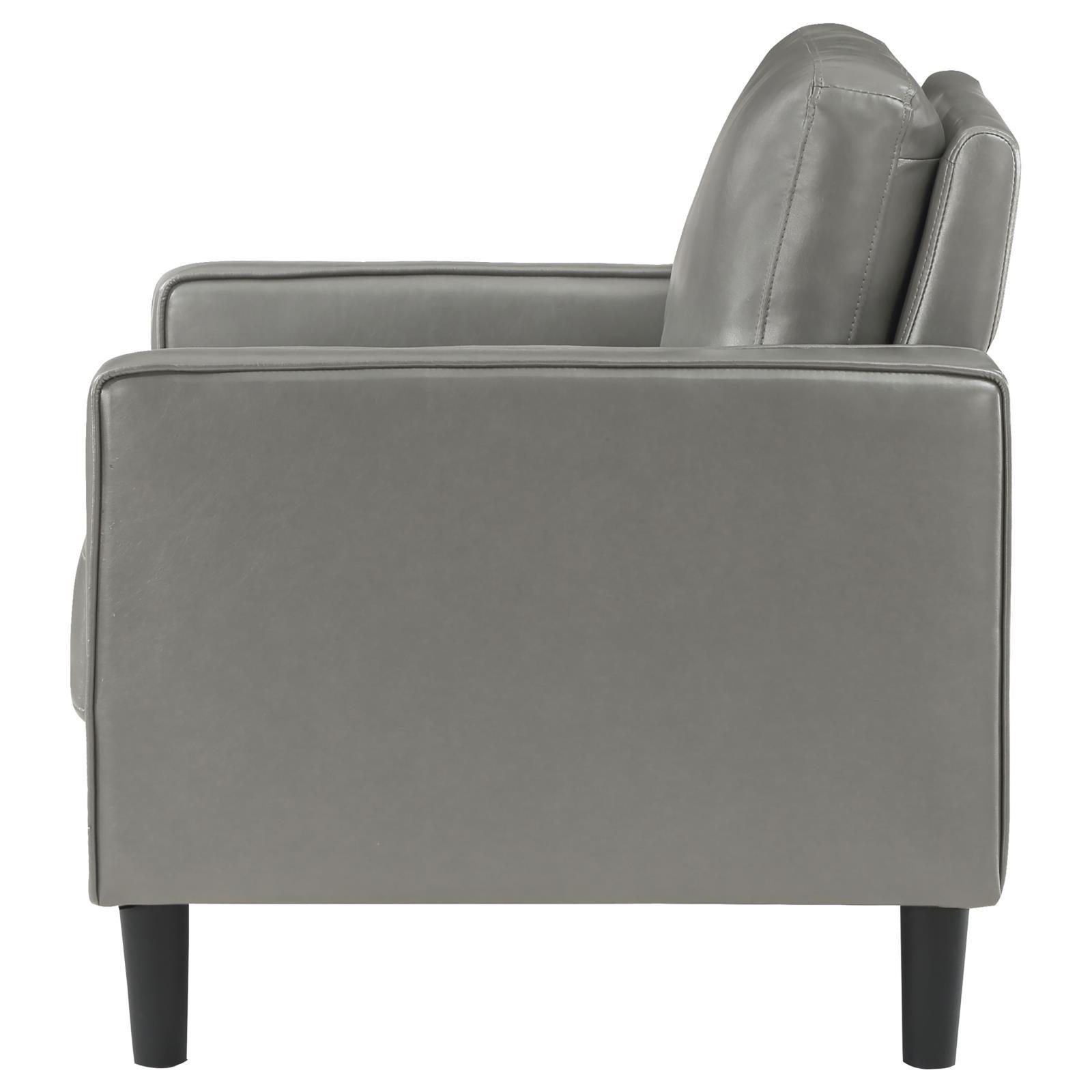 Side detail of Ruth Grey Faux Leather Accent Chair armrest