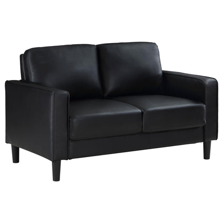 Ruth Black Faux Leather Upholstered Track Arm Loveseat angled view