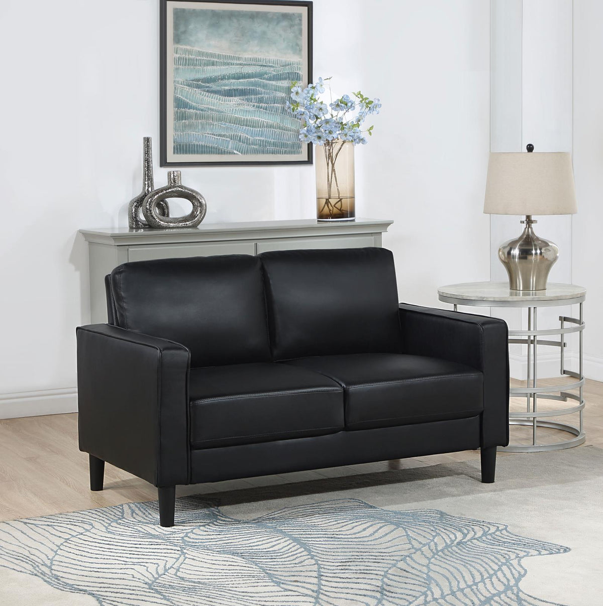 Ruth Black Faux Leather Upholstered Track Arm Loveseat side view