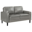 Ruth Loveseat front angle showing grey leatherette upholstery and track arms