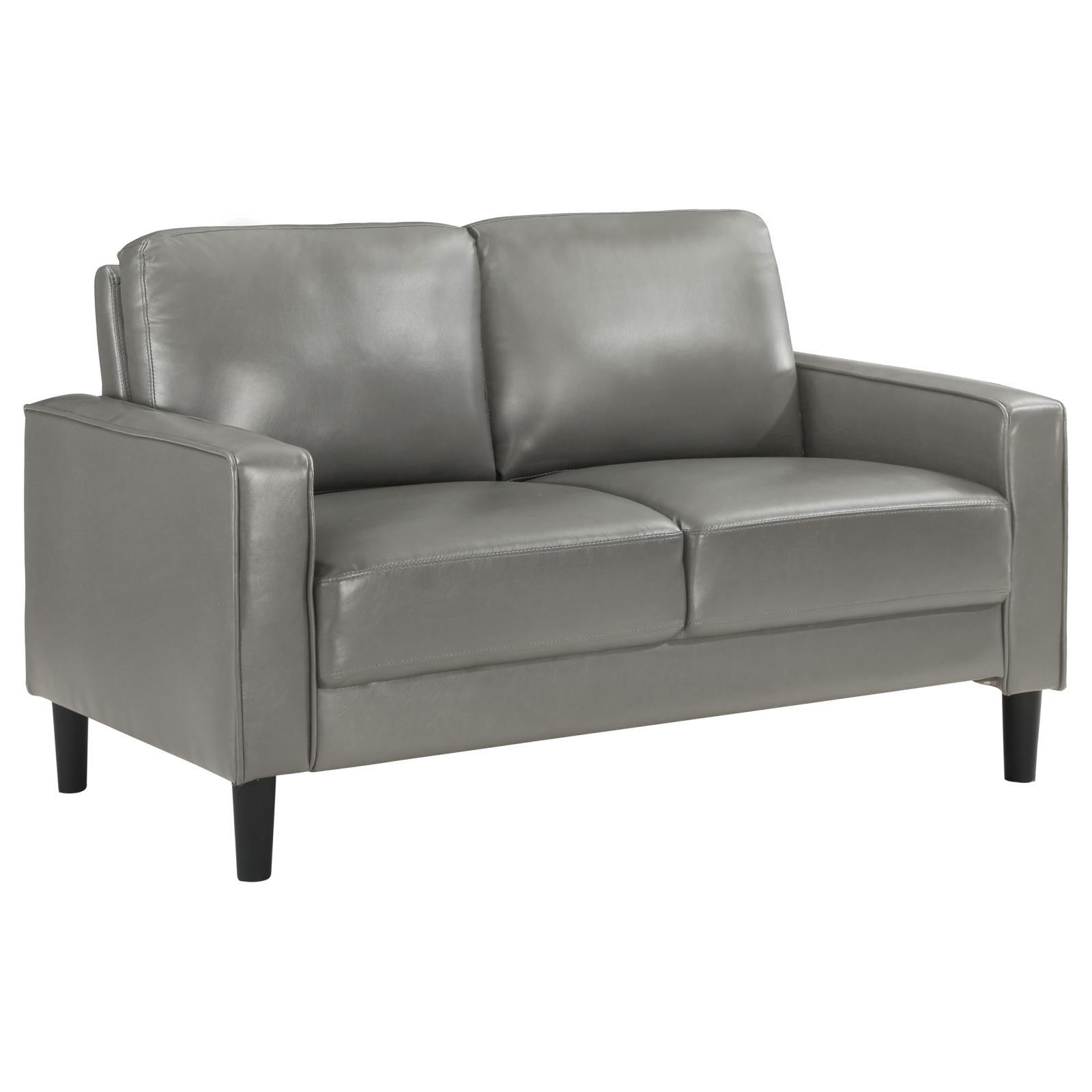Ruth Loveseat front angle showing grey leatherette upholstery and track arms