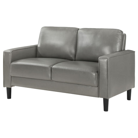 Ruth Loveseat showcasing tapered plastic legs and modern silhouette