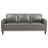 close-up of grey faux leather upholstery on Ruth sofa arm
