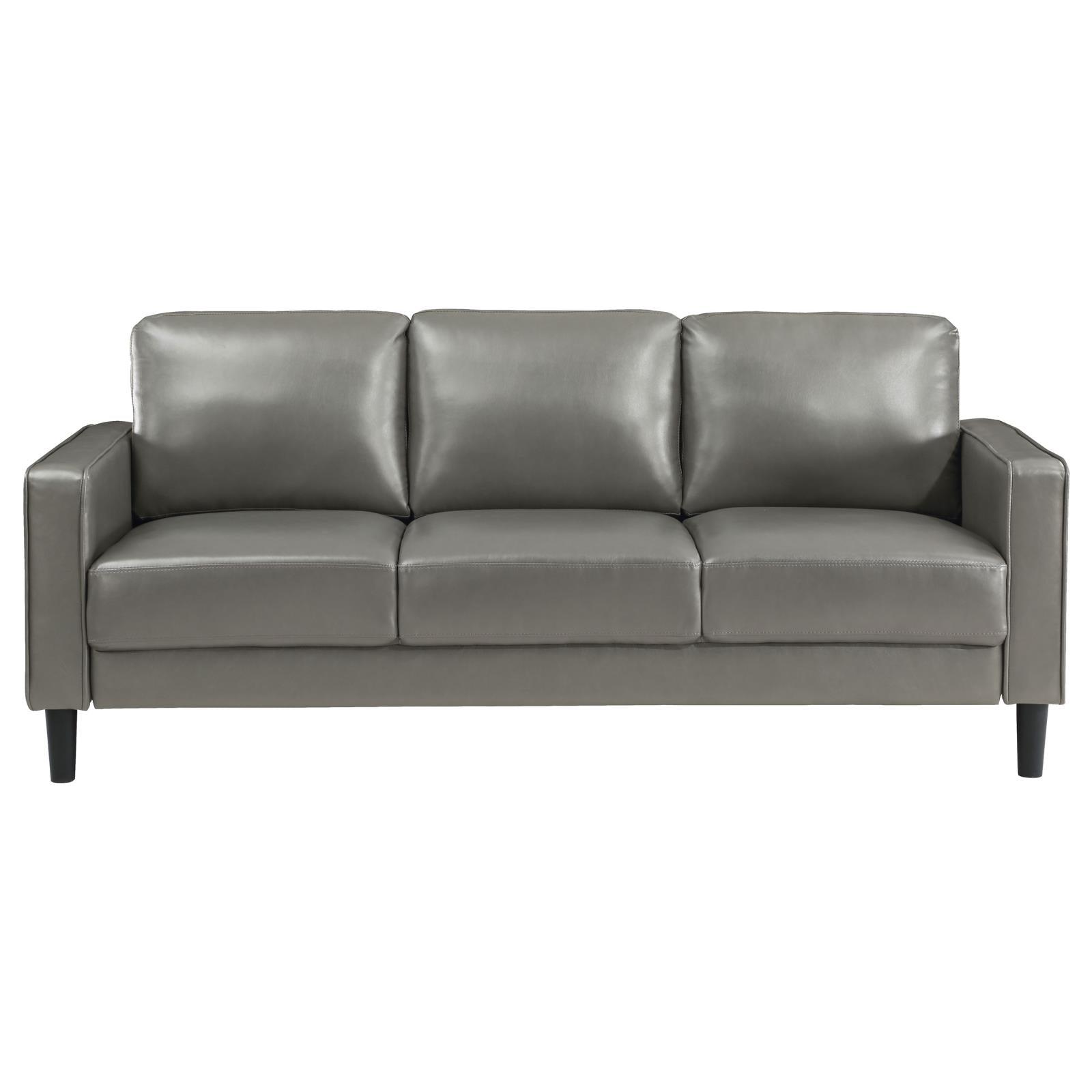 close-up of grey faux leather upholstery on Ruth sofa arm