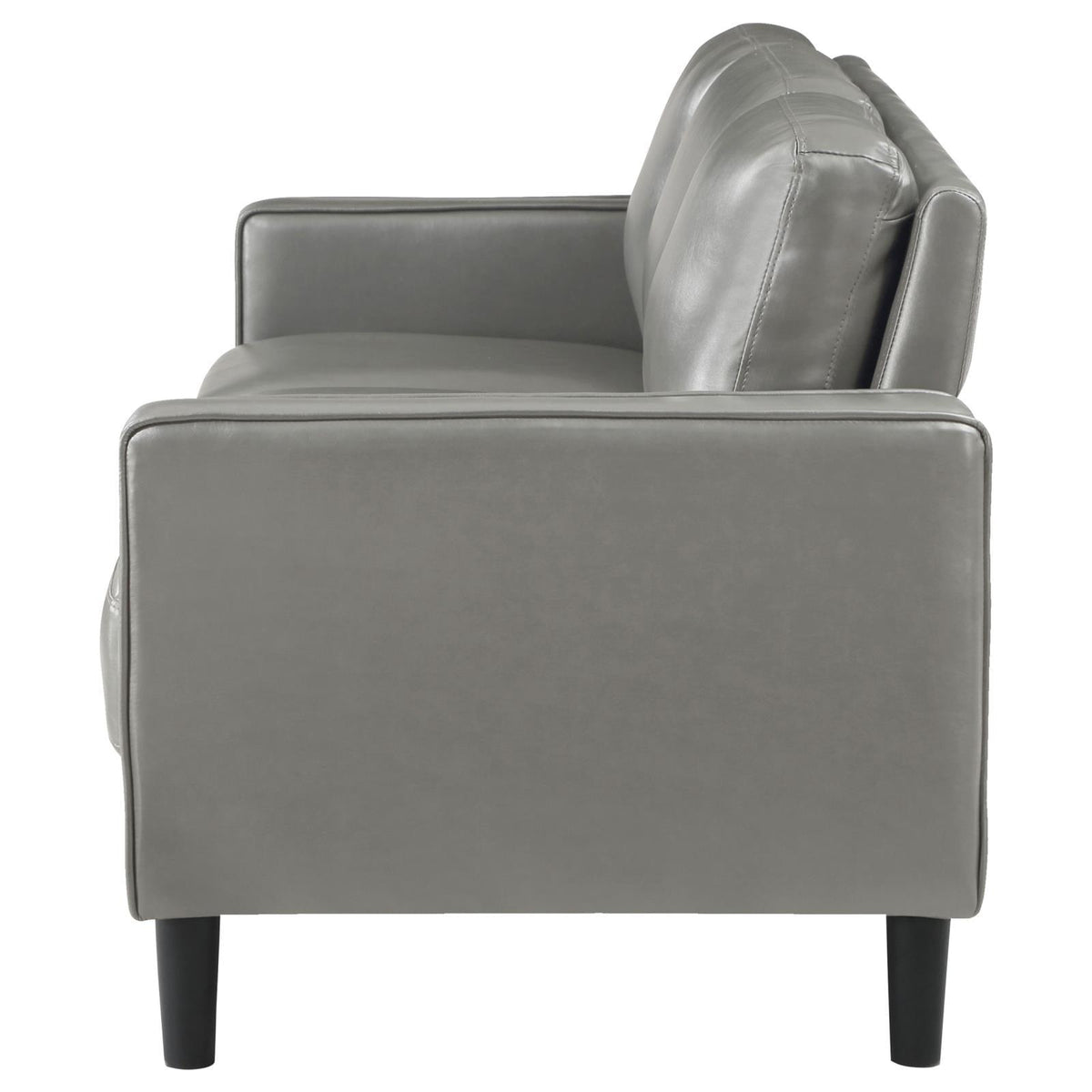 side angle of Ruth grey faux leather sofa showing seat cushions