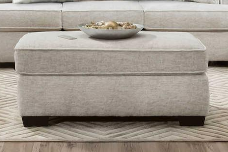 Ritzy Cream Ottoman angled view
