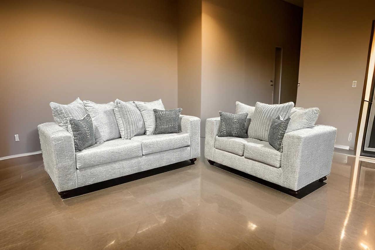 Rivera sofa and loveseat set in black fabric, front view