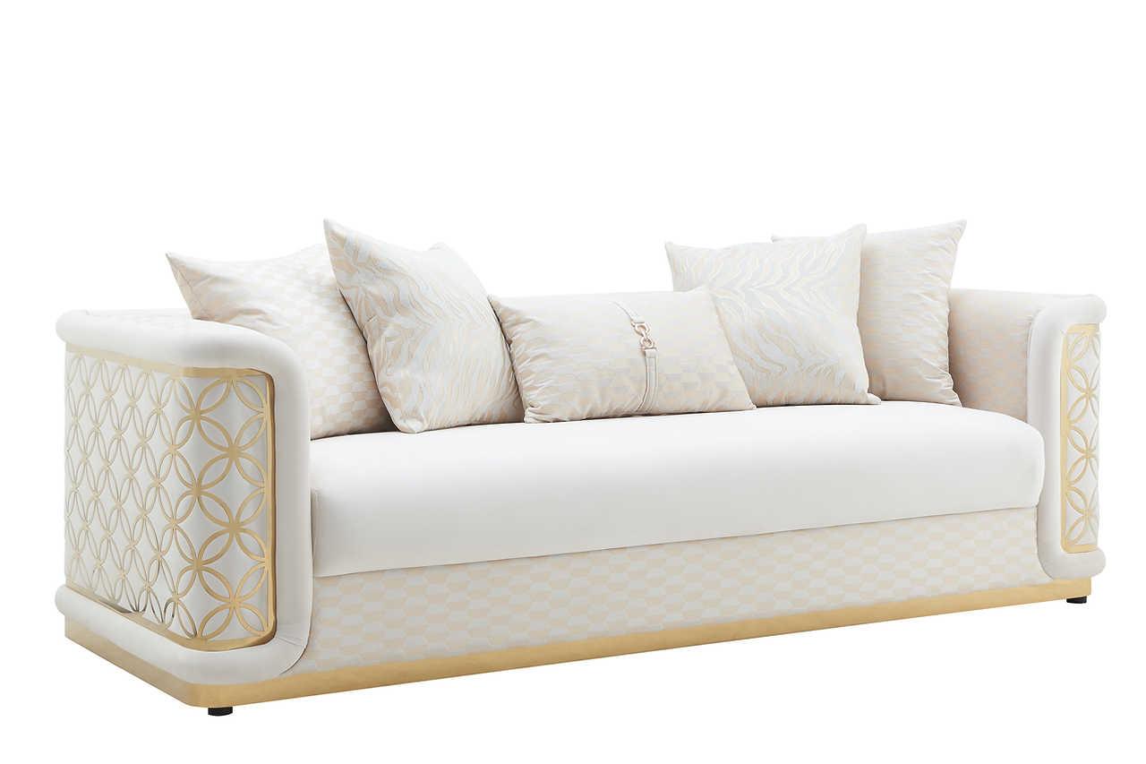 Detail of cream fabric with gold accents on Riya set