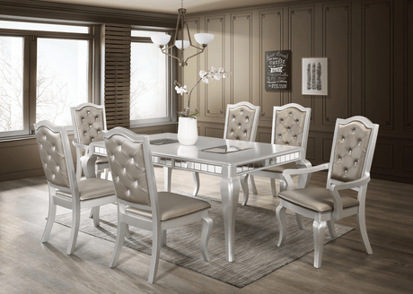 Calabella dining set with silver finish and six faux leather chairs