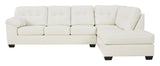 Side view of Ashley RAF Chaise sectional sofa showcasing white metal legs