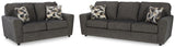 Ashley Slate thick fabric upholstered loveseat, side view