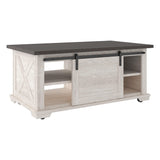 Dorrinson two-tone gray and antique white coffee table side angle showing storage