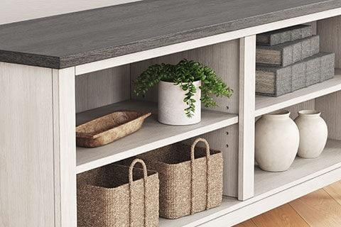 Dorrinson Two-Tone Antique White Corner TV Stand storage cabinet detail