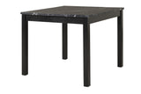Room view of Dior Onyx dining set showcasing black faux marble top and chairs