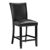 Side view of Finley marble top dining table with black faux leather chairs