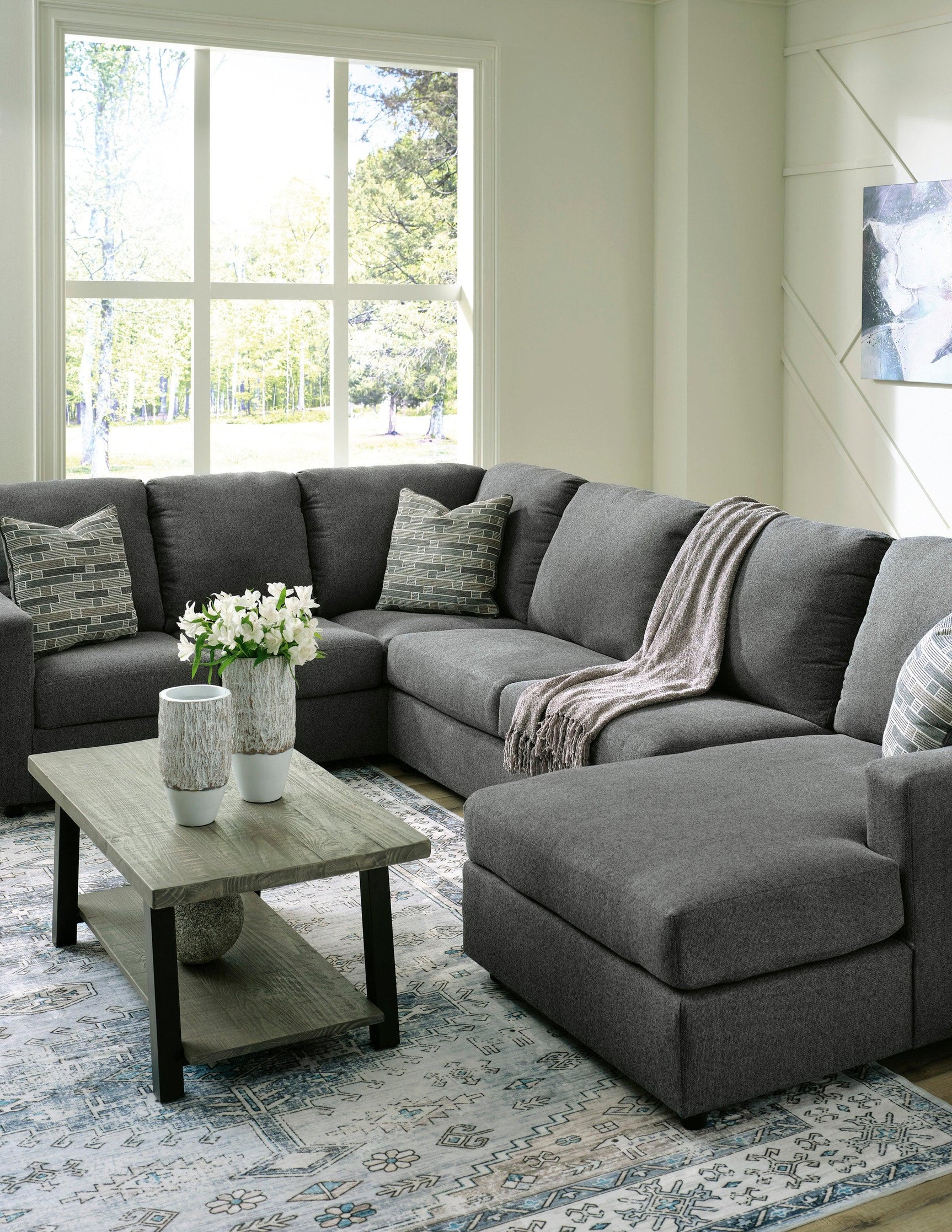 Side view of Ashley 290-03 charcoal sectional with chaise